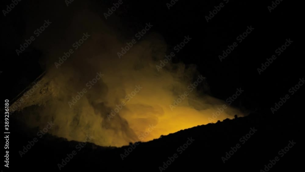 Electric furnace with melting metal and rising smoke Electric furnace with melting metal and rising smoke