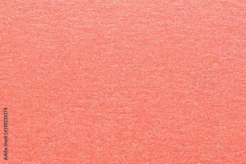 Texture of pink shiny metallic paper