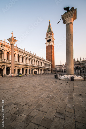 San Marco square in Venice, Italy with belfry and statues