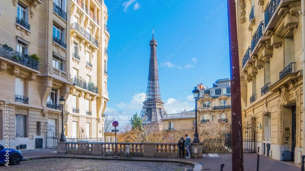 4k timelapse video of the cozy street with view of Eiffel Tower in Paris.Romantic view from a small paris street on a cloudy autumn day in spring summer - wide horizontal panorama 4k timelapse video of the cozy street with view of Eiffel Tower in Paris.Romantic view from a small paris street on a cloudy autumn day in spring summer - wide horizontal panorama