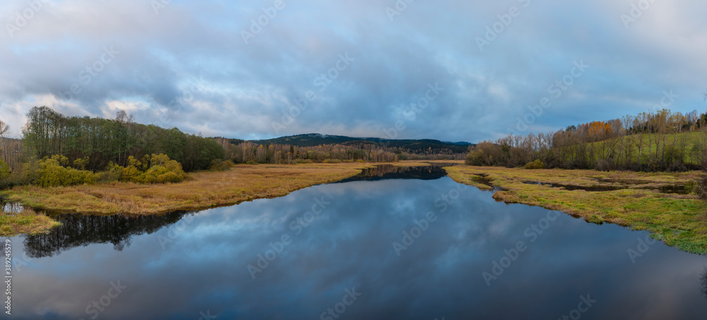 End of Lipno sea reservoir in autumn cloudy color morning