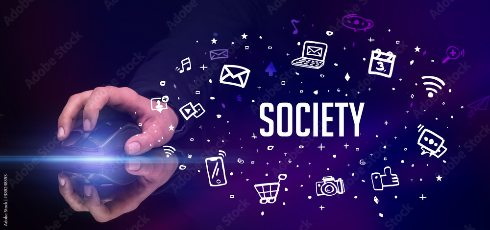 hand holding wireless peripheral with SOCIETY inscription, social media concept hand holding wireless peripheral with SOCIETY inscription, social media concept