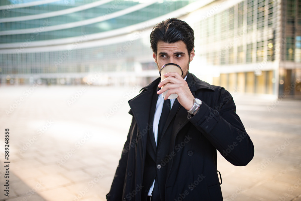 Portrait of a businessman drinking a cup of coffee