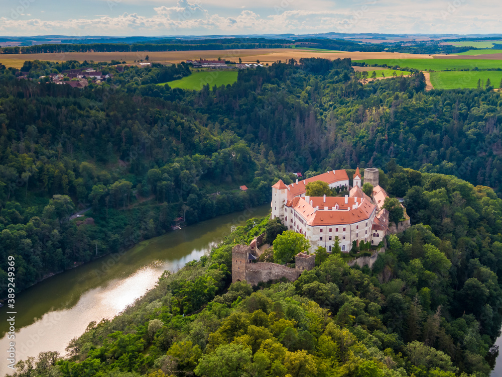 Aerial view of Bitov castle near Dyje river. Landscape panoramic view of medieval castle on top of hill with forest around. South Moravia region, Czech republic.