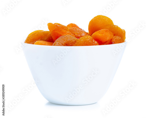 dried apricots fruit in bowl on a white background isolation