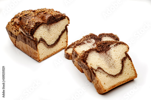 Slices of Romanian sponge cake with cocoa and nuts