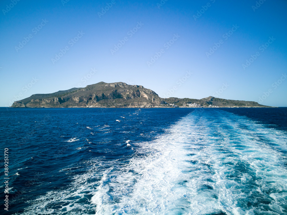 Levanzo Island in the Egadi in the Mediterranean sea seen from the ferry boat in the middle of the sea