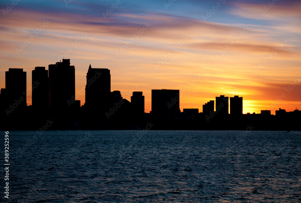 silhouette boston skyline at sunset