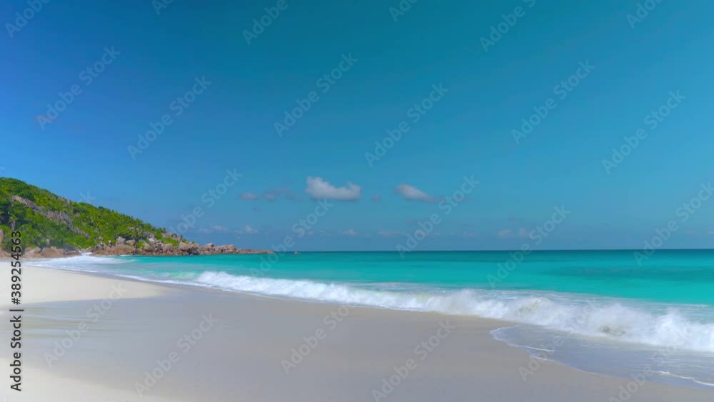 Beautiful beach on an exotic island with ocean and blue sky Beautiful beach on an exotic island with ocean and blue sky