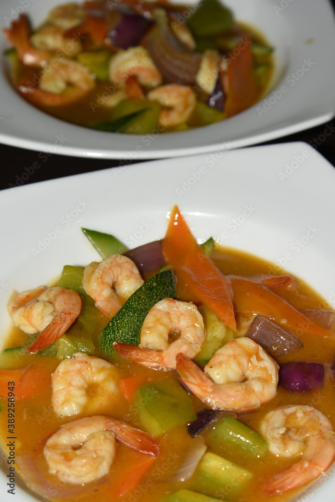 Cleaned and Cooked Shrimps in the Plate With Sauce Cleaned and Cooked Shrimps in the Plate With Sauce