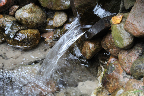 Canvas-taulu pure spring water flowing from a pipe
