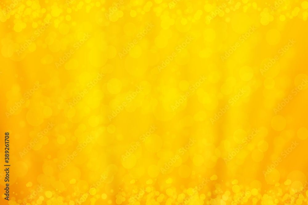 Yellow bokeh lights abstract background