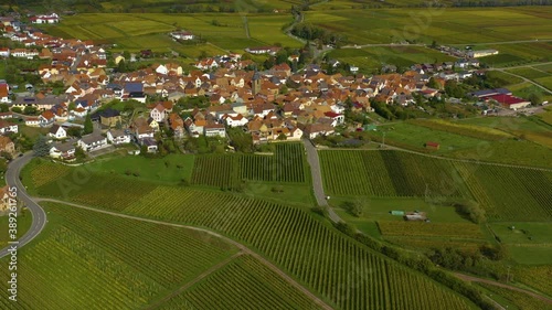 Aerial view of vineyards, houses around the village Burrweiler and Frankweiler in the Pfalz in Germany. On a sunny day in Autumn, fall. photo