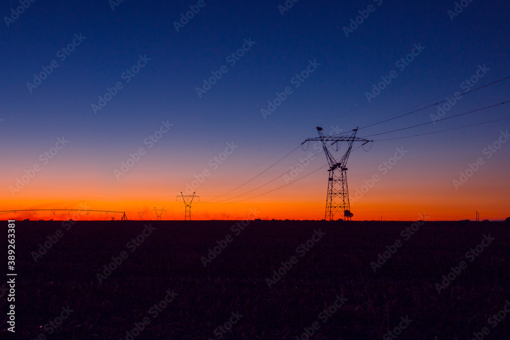 Electric tower at an autumn sunset