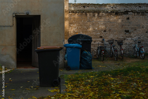 Garbage place in a backyard, garbage cans in a Berlin backyard