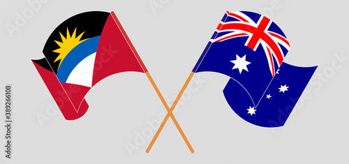 Crossed and waving flags of Antigua and Barbuda and Australia