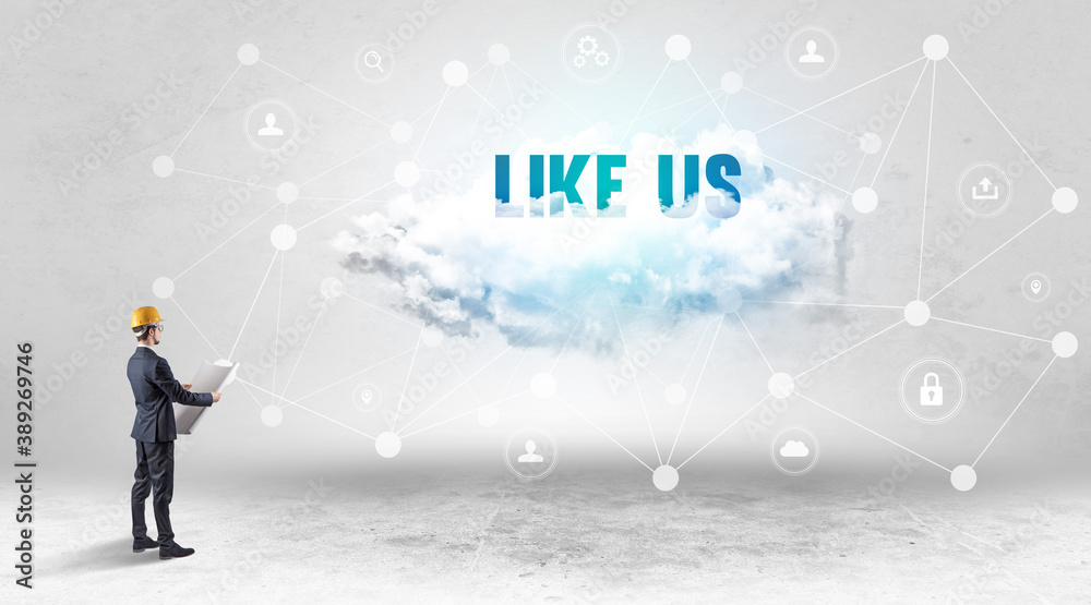 Engineer working on a social media concept with LIKE US inscription Engineer working on a social media concept with LIKE US inscription