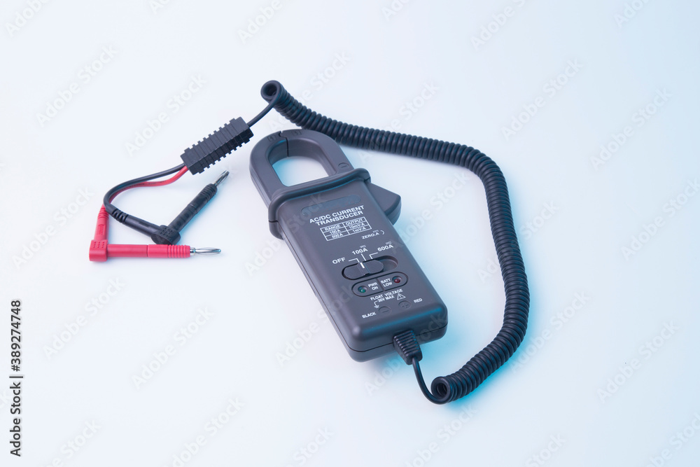 Current transducer. Current clamp. A tool for measuring electric current. Current transducer. Current clamp. A tool for measuring electric current.