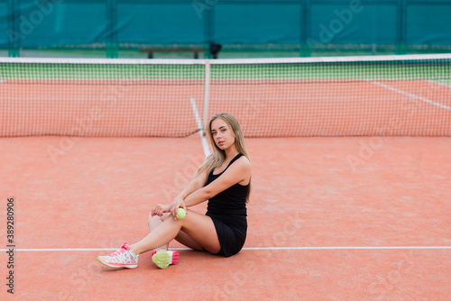Tennis tournament. Female player at the clay tennis court © Ivan Zelenin