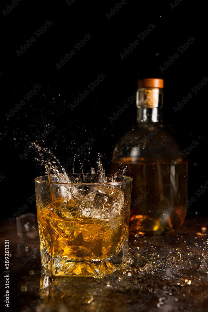 splash with a whiskey aged in a wooden barrel splash with a whiskey aged in a wooden barrel