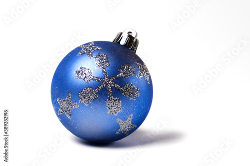 Blue Christmas tree bauble sphere with silver snowflakes isolated on white