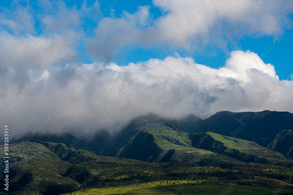 West Maui Mountains covered in clouds in Hawaii
