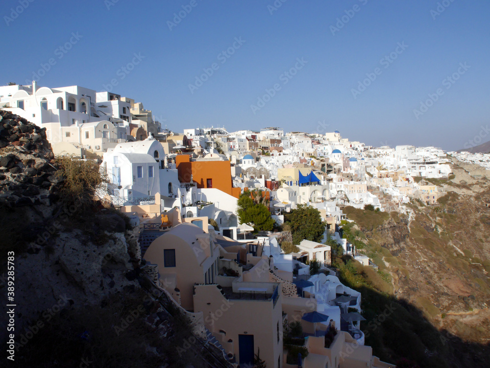 Magic Oia, Sanorini island Greece. Views of the historical part of the city of Oia. Streets and houses of the old city.