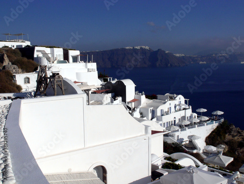 Magic Oia, Sanorini island Greece. Views of the historical part of the city of Oia. Streets and houses of the old city. photo