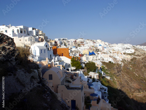 Magic Oia, Sanorini island Greece. Views of the historical part of the city of Oia. Streets and houses of the old city. photo