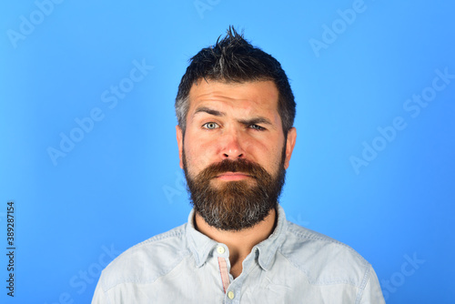 Serious man. Bearded man looking at camera. Portrait of serious man. Isolated.