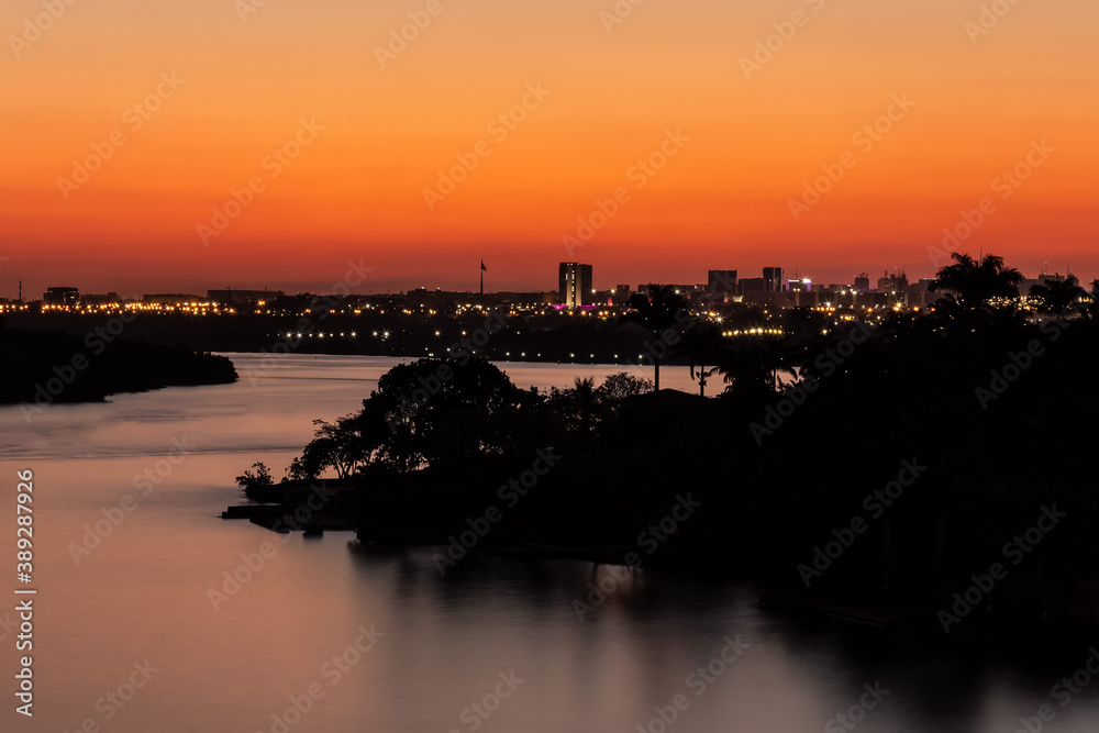 Sunset in Brasilia, the capital of Brazil, seen from Lago Norte. The city of amazing skies. Cerrado. Nightview.