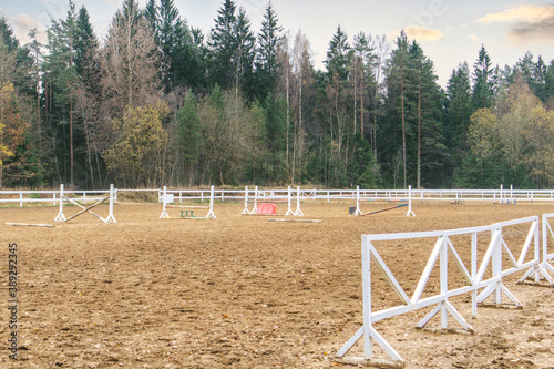 Hippodrome for English riding show jumping horse training sand barrier  photo