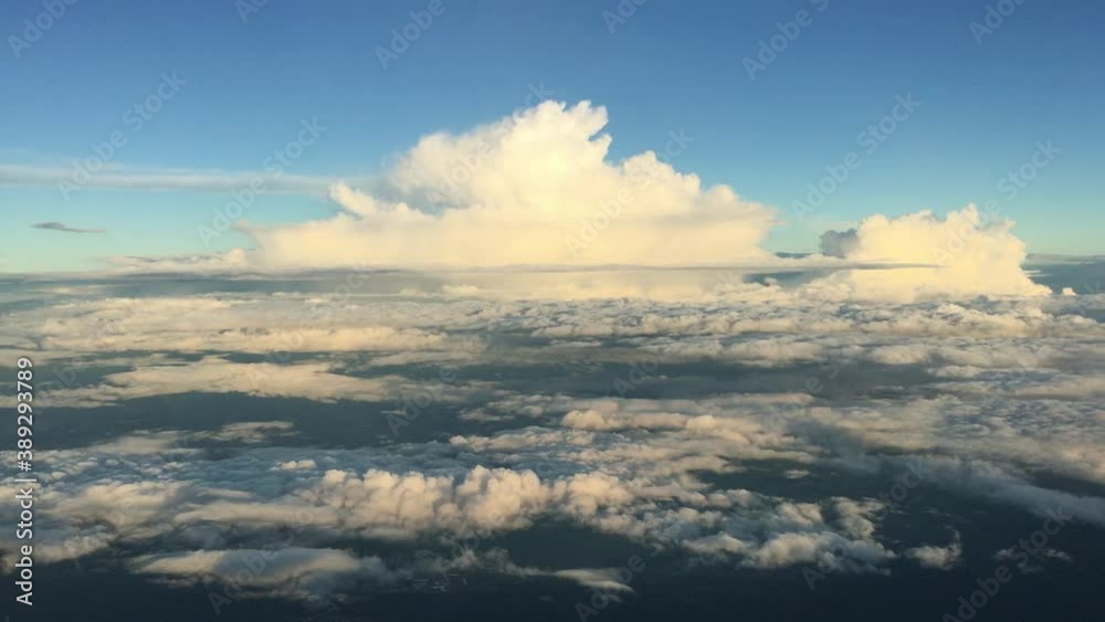 View of sky and clouds from airplane window in evening, Sky horizontal line View of sky and clouds from airplane window in evening, Sky horizontal line