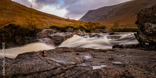 shot of the waterfalls in glen etive near loch etive and the entrance to glencoe and rannoch moor in the argyll region of the highlands of scotland during autumn