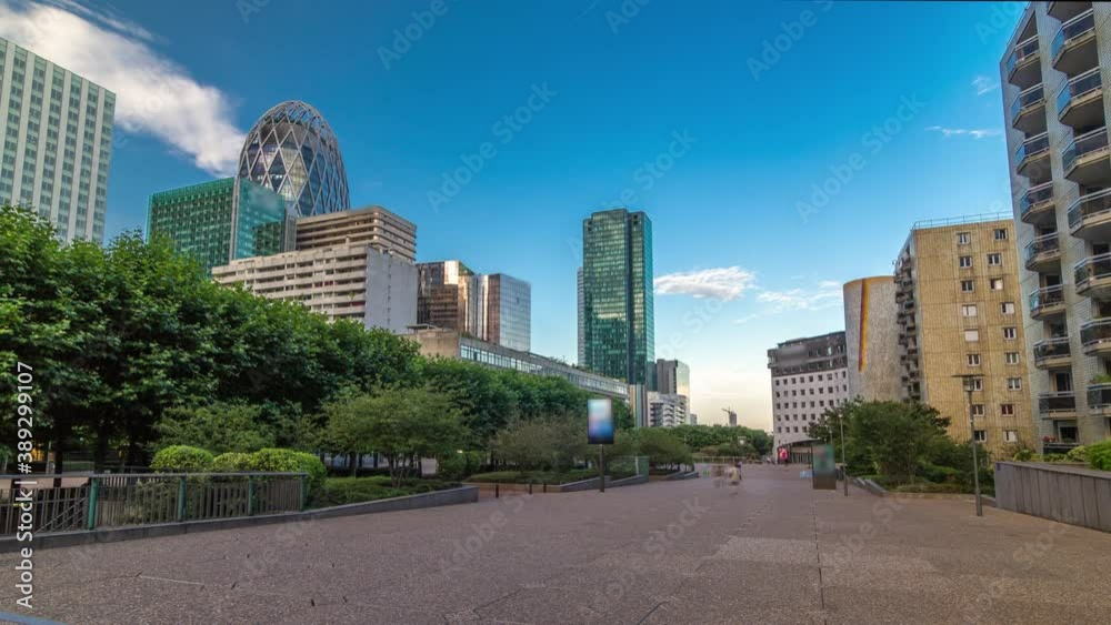 Skyscrapers of La Defense timelapse hyperlapse - Modern business and residential area in the near suburbs of Paris, France. Blue cloudy sky at sunny summer day befire sunset Skyscrapers of La Defense timelapse hyperlapse - Modern business and residential area in the near suburbs of Paris, France. Blue cloudy sky at sunny summer day befire sunset