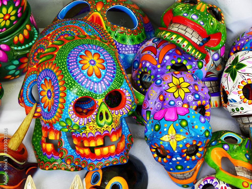 Obraz premium Colorful masks. Handicrafts souvenirs from Cotopaxi province of Ecuador. Masks represent different characters of ecuadorian folk culture.