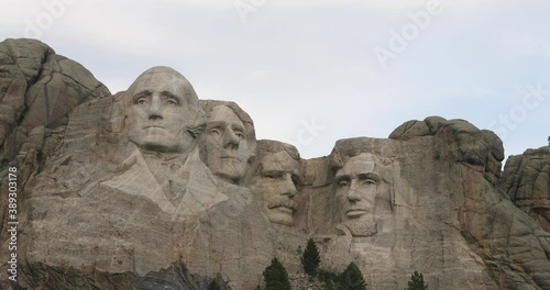 Mount Rushmore monument close snap pan 4K. National Memorial carved into granite in the Black Hills South Dakota. President Washington, Lincoln, Jefferson and Roosevelt. photo
