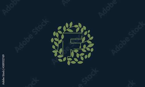 Letter F with leaf green garden nature ornament  logo vector icon  design