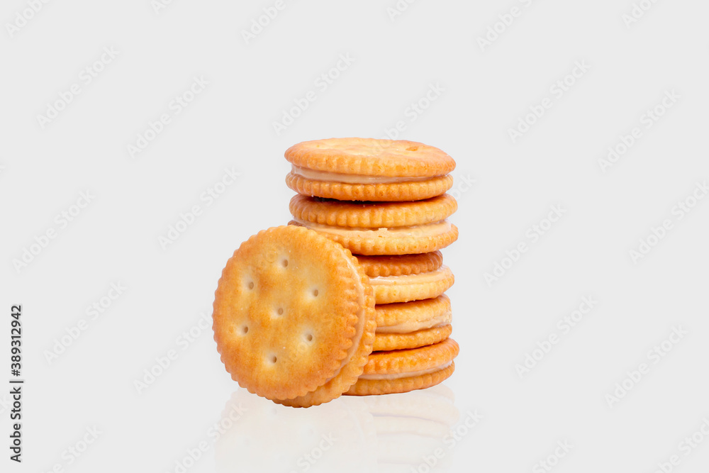 A stack of delicious peanut butter biscuits isolated on white background A stack of delicious peanut butter biscuits isolated on white background