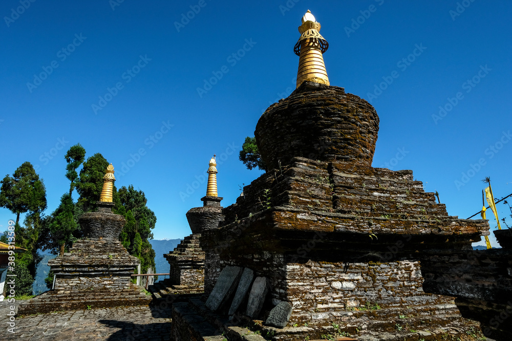 Pelling, India - October 2020: Stupas at the Buddhist Sanghak Choeling Monastery in Pelling on October 31, 2020 in Sikkim, India.