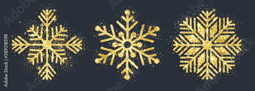 Vector illustration of snowflakes with golden glittering texture. New year and Christmas design elements
