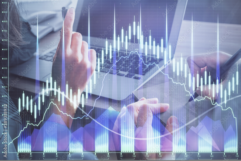 Double exposure of man and woman working together and forex chart hologram. Business concept. Computer background. Double exposure of man and woman working together and forex chart hologram. Business concept. Computer background.