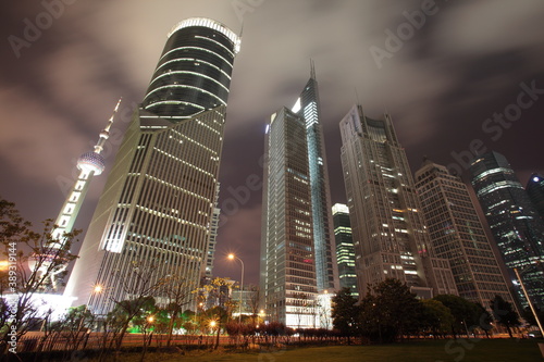 Photography Night view of Shanghai Finance and Trade district Pudong Lujiazui skyscrapers with  Oriental Pearl Tower and   Bank of China Tower in Shanghai, China