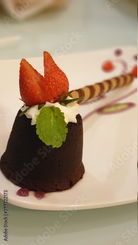 molten lava cake with strawberry on top