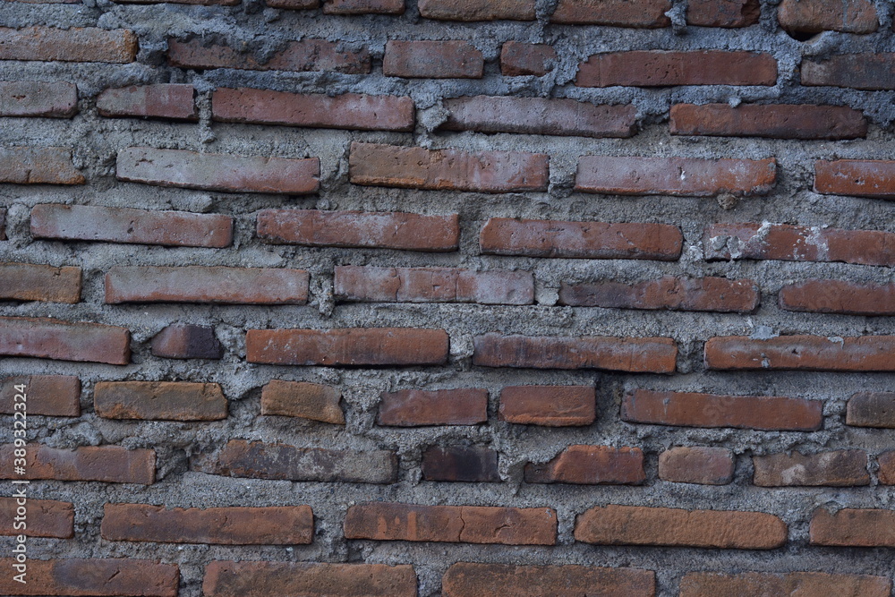 old red brick walls with a layer of cement and sand old red brick walls with a layer of cement and sand