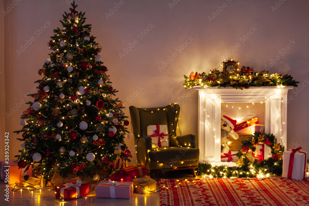 Christmas tree pine with gifts light garlands interior decor new year
