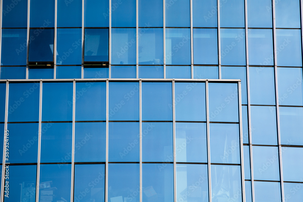 Closeup modern blue glass building