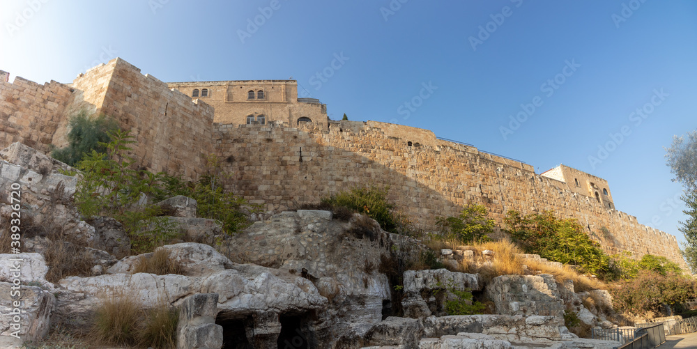 jerusalem-israel. 30-10-2020. A panoramic view of the walls of the Old City and the Jewish Quarter, with two ancient caves in the foreground