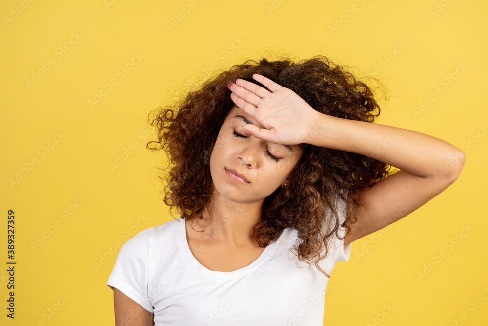 Adult afro american woman on yellow copy space background Adult afro american woman on yellow copy space background