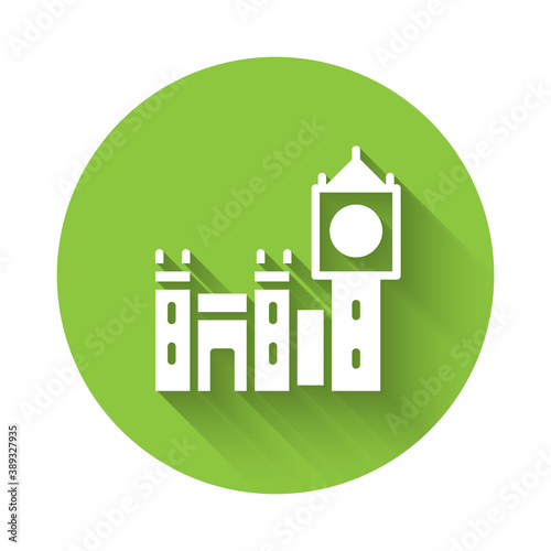 White Big Ben tower icon isolated with long shadow. Symbol of London and United Kingdom. Green circle button. Vector.